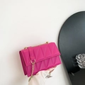 Fuchsia quilted crossbody bag with stylish gold chain strap and geometric stitching - Rose Red