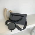 Dark grey industrial crossbody bag with chain detail and round coin purse attachment - Gray
