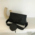 Black utility crossbody bag with decorative chain and mini round coin pouch on strap - Black