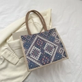 Ethno-Canvas-Shopper mit geometrischem Rautenmuster und braunen Tragegriffen - Blau