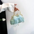Lichtgroene tweed handtas met blauwe organza strik en details van parelhanger - Groen