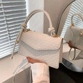 Elegant white crossbody bag with cross-weave texture and gold buckle in natural light - White