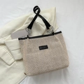Minimalistische beige Web-Tragetasche mit schwarzen Lederriemen und Metallbeschlägen - Schwarz