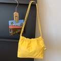 Bright yellow pleated soft leather shoulder bag with quilted pattern and gold ball chain - Yellow