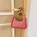 Pink synthetic leather half-moon shoulder bag with adjustable strap and gold zipper - Pink