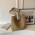 Elegante bolso tote acolchado caqui con textura tejida suave para el transporte diario - Caqui