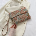 Elegante pochette vintage a fiori con chiusura a fiore dorato e cinturino da polso in tessuto - Jacquard Floreale Rosso