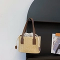 Borsa a secchiello in paglia intrecciata con manico in pelle marrone e fodera beige - Marrone