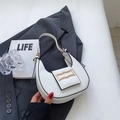 White crescent moon shoulder bag featuring a sleek gold geometric buckle and black trim - Off White