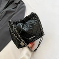 Quilted black leather bucket bag with silver chain strap and cloud-shaped drawstring top - Black