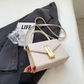 Minimalist cream white square shoulder bag with gold metal lock and leather texture - Off-white