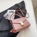 Pink trapezoidal shoulder bag with cross-pattern leather and gold metal buckle - Pink