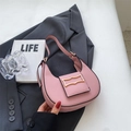 Modern pink dumpling shaped shoulder bag with golden buckle and black piping detail - Pink