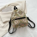 Ethnic style mini backpack featuring colorful geometric woven patterns and black straps - Green