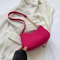 Magenta crescent shoulder bag with V-shaped quilting and chain strap detail - Rose Pink