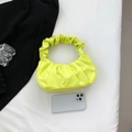 Fluorescent yellow pleated shoulder bag with trendy ruched handle and glossy finish - Yellow