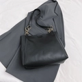 Classic black faux leather tote bag with gold chain strap detail on grey blazer - 33x27x11cm / Black Large