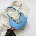Sky blue crocodile texture crescent bag with stylish gold chain strap detail - Blue