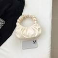 Chic beige pleated cloud handbag with elegant ruched texture and a matching handle - Beige