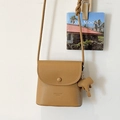 Minimalist khaki crossbody bag with lychee texture and elephant leather pendant - Brown