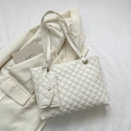White quilted tote bag in glossy PU leather with matching mini zipper pouch accessory - White
