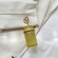 Mini glitter yellow-green cylindrical chain bag with gold zipper and keychain detail - Yellow