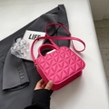 Levendige rozerode gewatteerde crossbodytas met handvat in stijlvolle lederlook - Rozerood