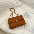 Quilted caramel brown shoulder bag with gold chain strap and V-pattern stitching - Brown