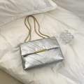 Silver quilted chain shoulder bag with V-shaped stitching and golden metal clasp - Silver