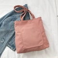 Pink corduroy tote bag with large front pocket and metal snap button closure - Pink