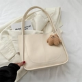Minimalist beige faux leather tote bag with U-shaped stitching and plush bear charm - With Pendant / White