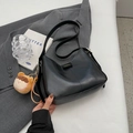 Minimalist black soft leather tote bag with a cute plush charm for daily commuting - Black With Pendant