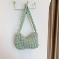 Chic light green pleated underarm bag with puffy texture and gold zipper detail - Green