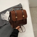 Vintage donkerbruine leren handtas met suède patchwork en gouden gespdetails - Koffie En Bruin Zonder Hanger