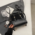 Vintage black crossbody backpack with suede paneling and cute monster plush charm - With Pendant / Black