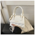 Detail of white PU leather crossbody bag featuring geometric quilted pattern and gold logo - White