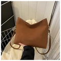 Detail of caramel suede tote bag with slim shoulder strap and golden metal buckle clasp - Dark Brown