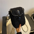 Chic black shearling mini crossbody bag with toggle button for winter fashion styles - Black