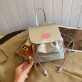 Silver metallic mini backpack with drawstring closure and cute plush monster charm - With Pendant / Silver