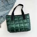 Quilted dark green tote bag with glossy metallic finish and black woven handles - Green