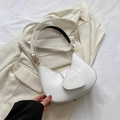 Minimalist white half-moon underarm bag featuring a heart-shaped LOVE embossed design - White