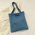 Klassische blaue Denim-Einkaufstasche mit zwei Fronttaschen und robusten Schultergurten - Hellblau