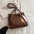 Brown litchi grain tote bag with woven straps and decorative silk scarf detail - Brown