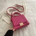 Magenta pleated crossbody bag for women with gold clasp and elegant top handle - Rose Pink