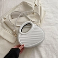 Chic off-white dumpling handbag with vertical pleats and golden ring handle - White