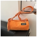 Dettaglio borsa a cilindro in velluto arancione con tracolla in corda intrecciata - Arancione