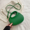 Vibrant green pleated dumpling bag with integrated handle and gold hardware detail - Green