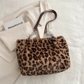 Stylish faux fur tote bag featuring classic leopard print and silver chain strap - Brown