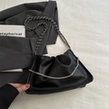 Sac à épaule en cuir grainé noir avec bandoulière tressée et détails en métal argenté - Noir