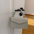 Sac bandoulière argenté à paillettes avec poignée nouée et design rectangulaire chic - Argenté